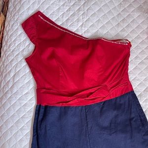 Red and blue jumpsuit with gems and one shoulder
